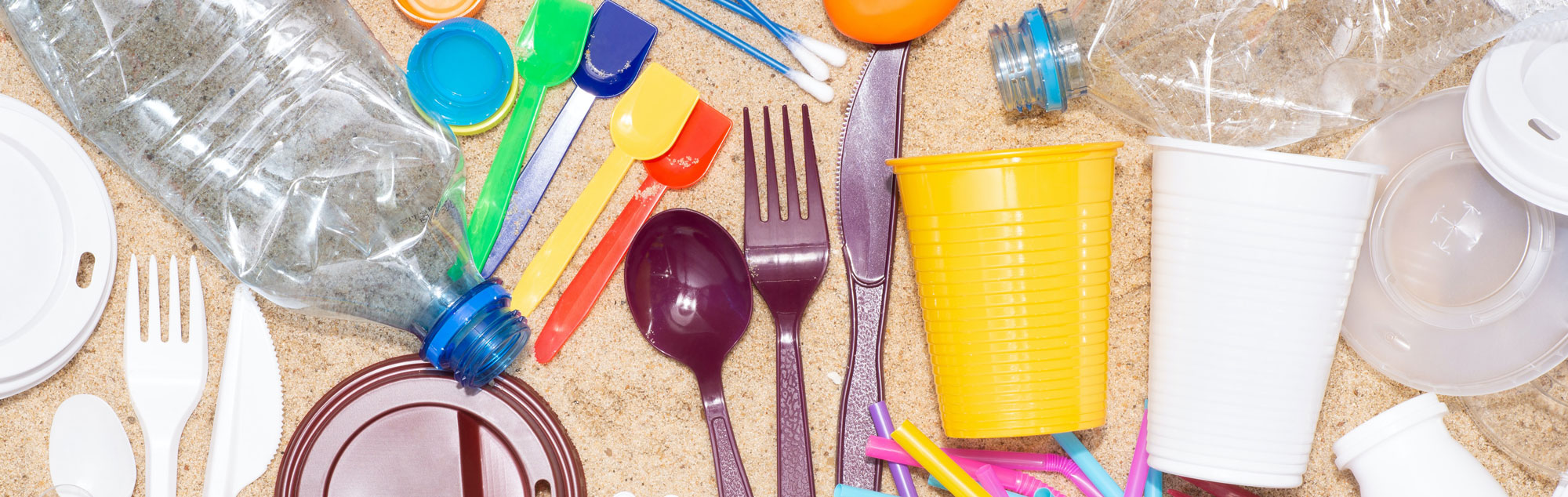 Random plastic utensils and trash