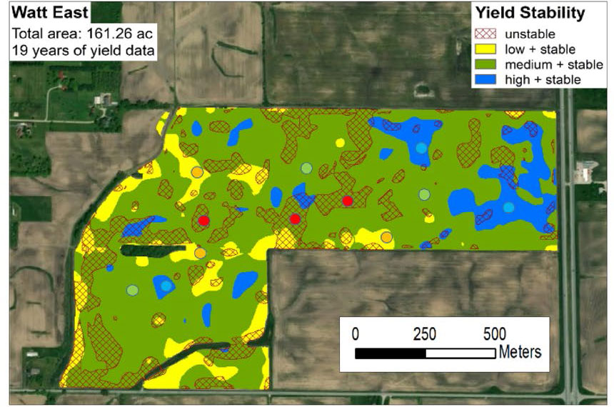 Satellite image of farm fields with soil data depicted with color overlay