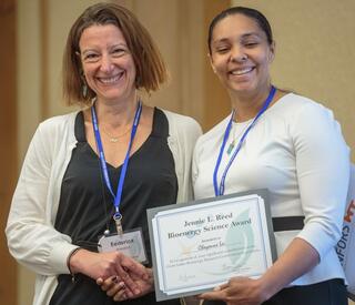 Federica Brandizzi and Cheyenne Lei pose for a picture with the Reed Bioenergy Award certificate