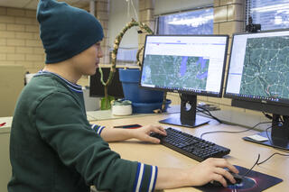 Postdoctoral researcher Yanhua Xie works at a computer at the Wisconsin Energy Institute in Madison, Wis. 